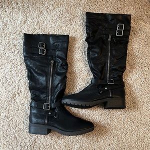 Woman’s black zip up boots size 8.5